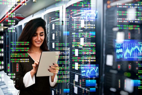 Female IT engineer in data center Female IT engineer in data center